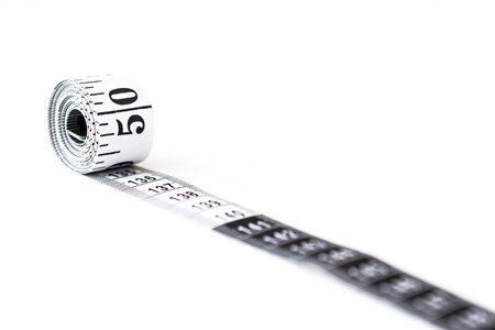 Measuring tape - Weight loss concept - fattening - sizeの写真素材