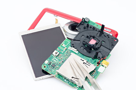 Dismantling of digital cameras for recycling