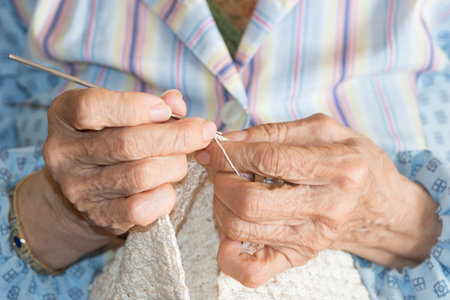 Detail of the hands of an elderly womanの写真素材