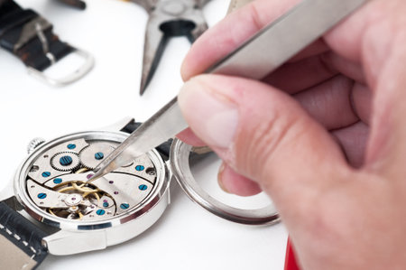 Timeless Precision: A Watchmaker's Artistry in Actionの写真素材