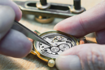 Timeless Precision: A Watchmaker's Artistry in Actionの写真素材