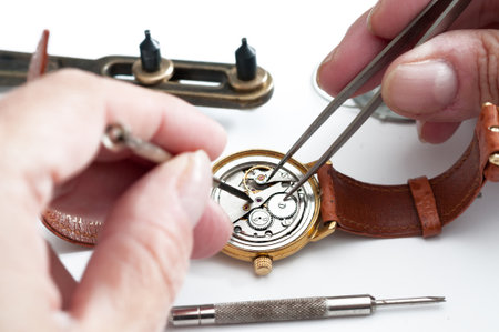 Timeless Precision: A Watchmaker's Artistry in Actionの写真素材