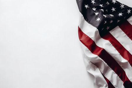 Top view of an American flag on a white background with copy space for textの素材