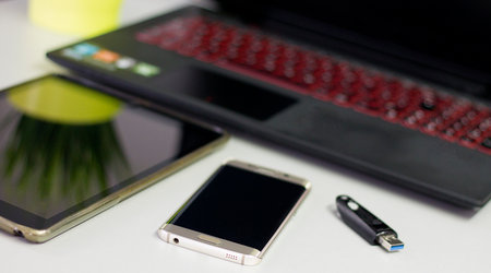 Laptop, tablet, smart phone - basic electronic devices for office work.の写真素材