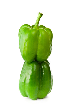 Green bell peppers isolated on white backgroundの写真素材