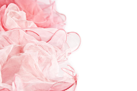 Pink silk scarf isolated on white backgroundの写真素材