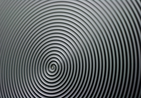 Stainless steel radial texture.