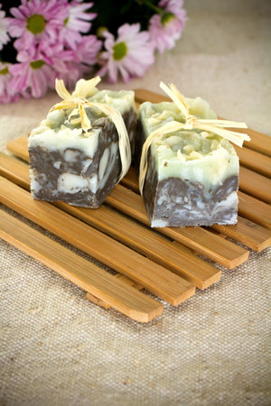 On wooden mats natural soap, handmade.の写真素材