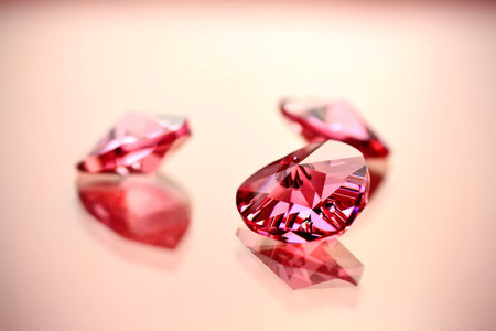 Pink crystal hearts on a pink background.の写真素材