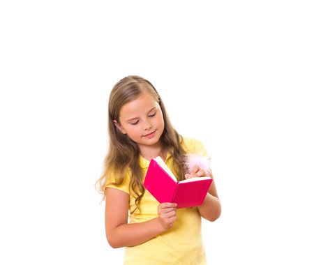 Girl holds the pink note pad の写真素材