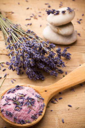 Wooden spoon with lavender sea salt  Spa stones の写真素材