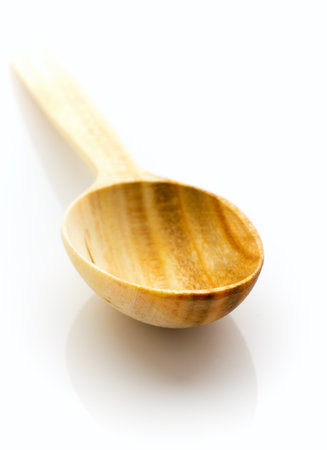 Wooden spoon isolated on the white background の写真素材