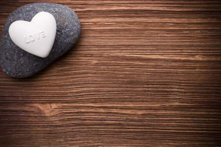 Spa stones in te wooden background.の写真素材