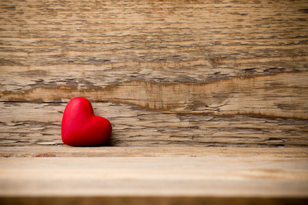 Red heart on the wooden  background.の写真素材