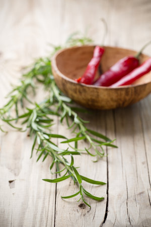 Rosemary on the white wooden background.の写真素材