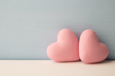 Pink heart on the wooden background.の写真素材