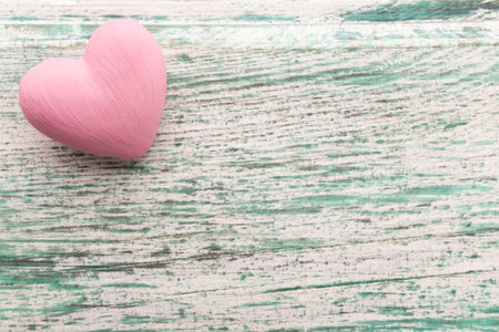 Pink heart on the wooden background. Provencal still.の写真素材