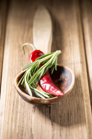 Chili pepper on wooden background, basic food background.の写真素材