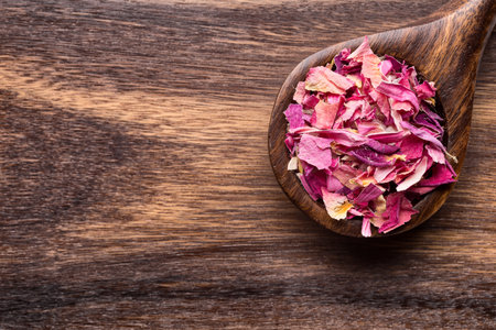 Homeopathic medicines assortment of wooden spoon on wooden background.の写真素材