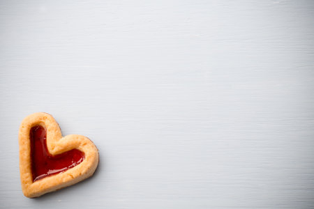 Heart-shaped cookies on a wooden background. Studio picture.の写真素材