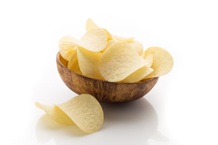 Eco potato chips on a white background. Studio photography.の写真素材