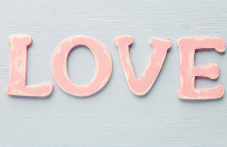 Message of love with wood pink letters.の写真素材