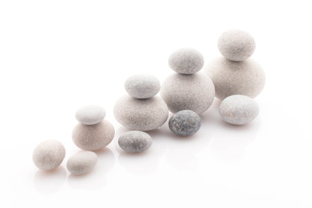 Spa massage stones with orchid. Studio photography.