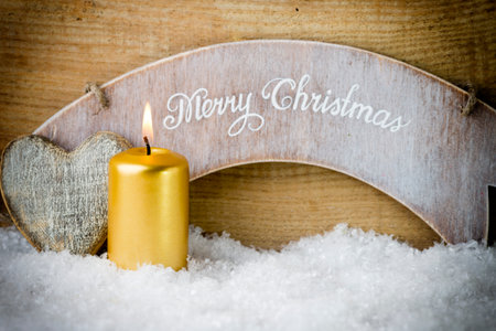 Christmas scene, candles with Christmas decor.の写真素材