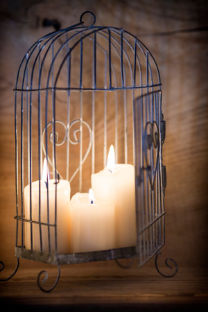 Candlestick cage style, candles, Valentine's Day decor.の写真素材