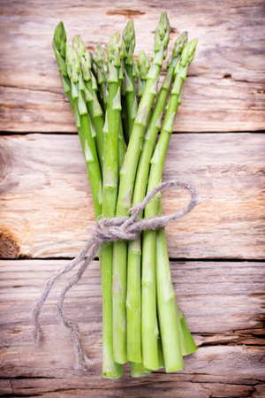 Asparagus on the wooden background.の写真素材