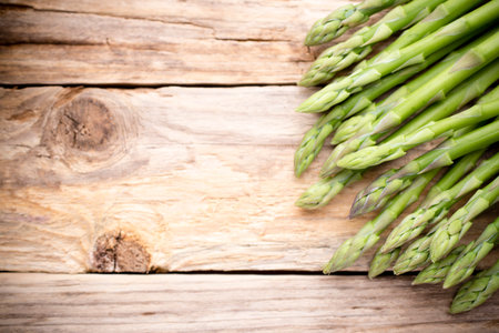 Asparagus on the wooden background.の写真素材