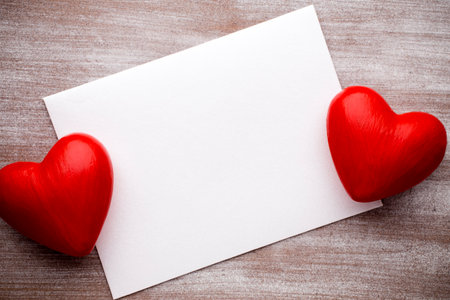 Valentine's Day greeting card. Heart on a wooden background.の写真素材