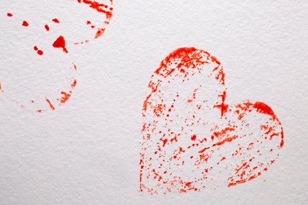 Heart print on the wooden backgroundの写真素材