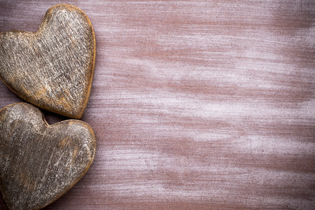 Hearts on a wooden background.の写真素材