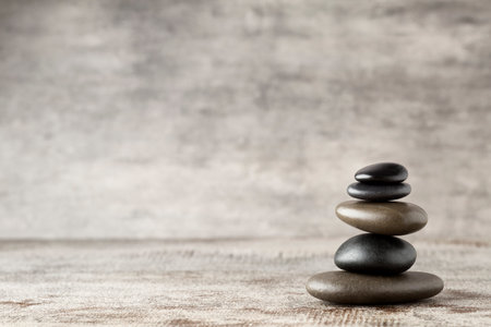 Spa stones on the grey background.