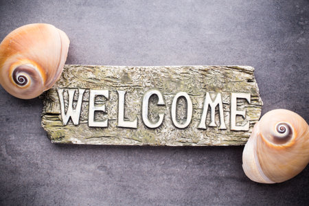 Inscription welcome marine accessories, starfish, shells.の写真素材