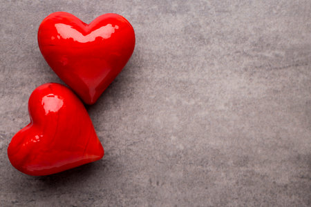 Red heart on the gray background.の写真素材