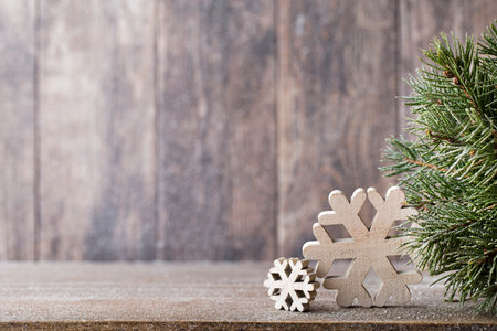 Fir branch and decor, on the wooden background.の写真素材