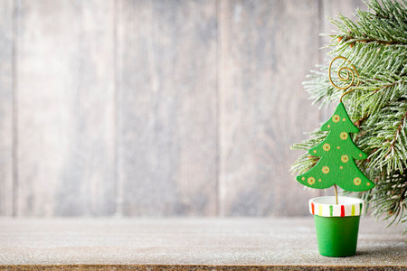 Fir branch and decor, on the wooden background.の写真素材