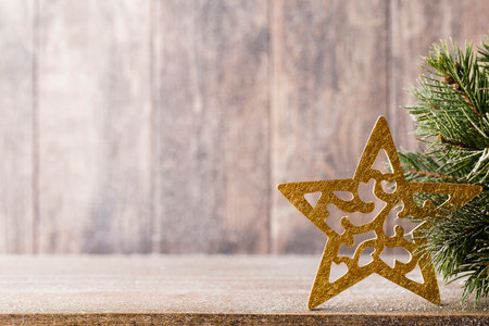Fir branch and decor, on the wooden background.の写真素材