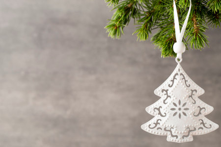 Christmas fir branch and decor, on the wooden background.の写真素材