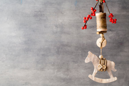 Christmas fir branch and decor, on the wooden background.の写真素材
