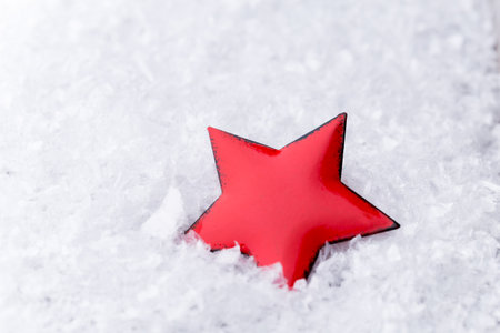 Silver star with christmas balls on the sparkling background.の写真素材