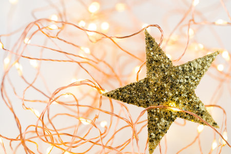 Christmas gold stars decoration on abstract background.の写真素材
