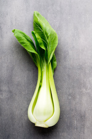 Fresh spinach on the gray mettal background.の写真素材