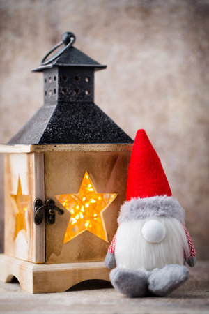 Christmas  lantern decor with gnome. Holiday greeting card.の写真素材