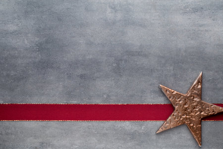 Christmas stars. Greeting card. Christmas pattern. Background on the gray color.の写真素材