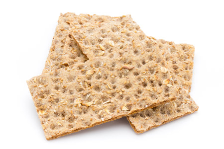 Stack of wholegrain crispy bread with sunflower, chia and sesames seedsの写真素材