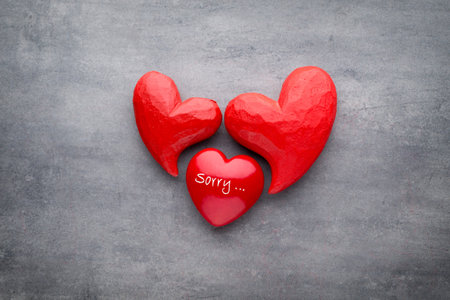 Red heart on the gray background