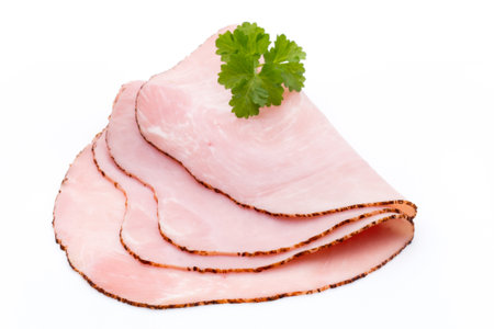 Sliced boiled ham sausage isolated on white background, top view.の写真素材